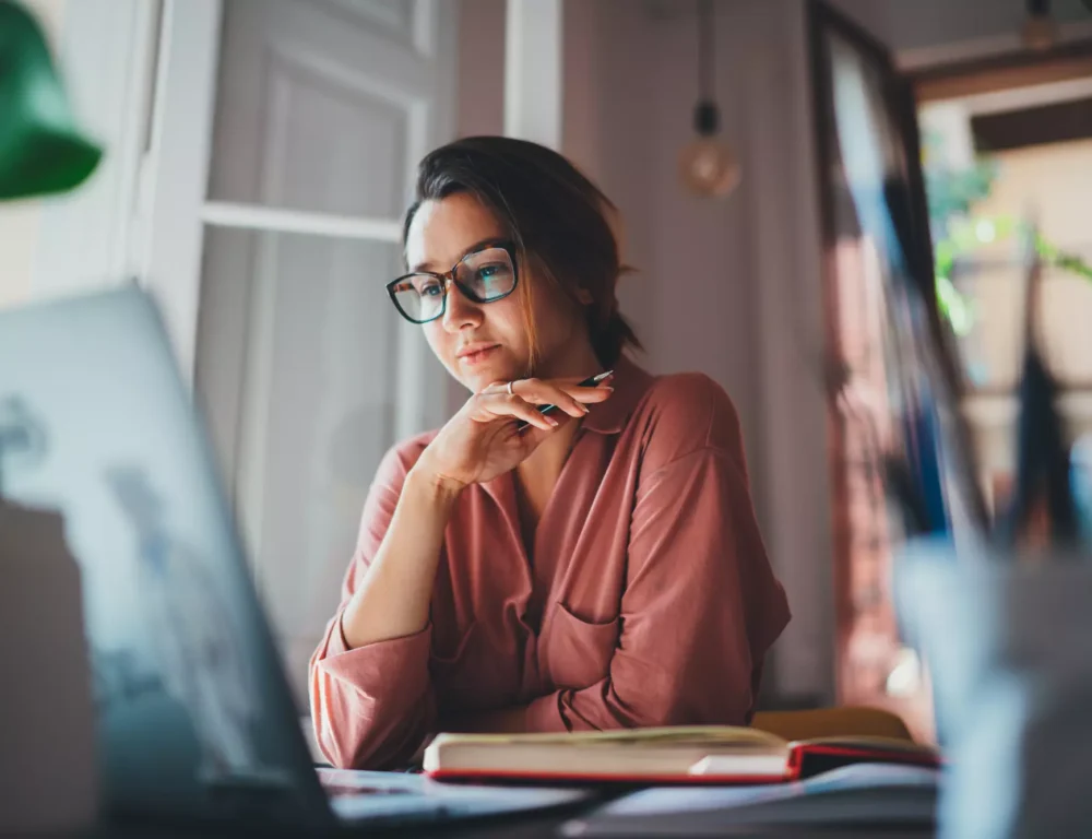 Copywriter working on a laptop
