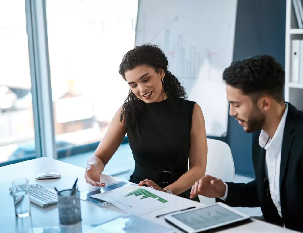 Two business professionals collaborating at a table